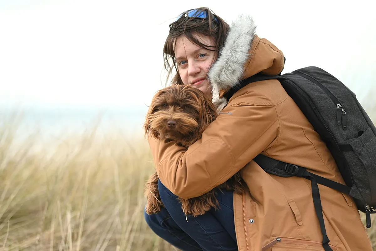 Sarah with a happy, relaxed dog